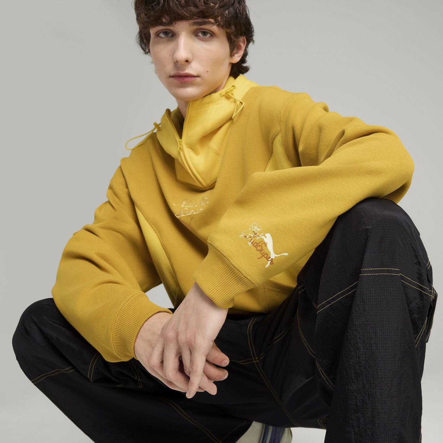 PUMA X KIDSUPER PROGRESSIVE HOODIE [Archive Gold]