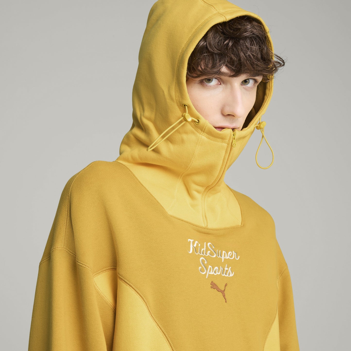 PUMA X KIDSUPER PROGRESSIVE HOODIE [Archive Gold]